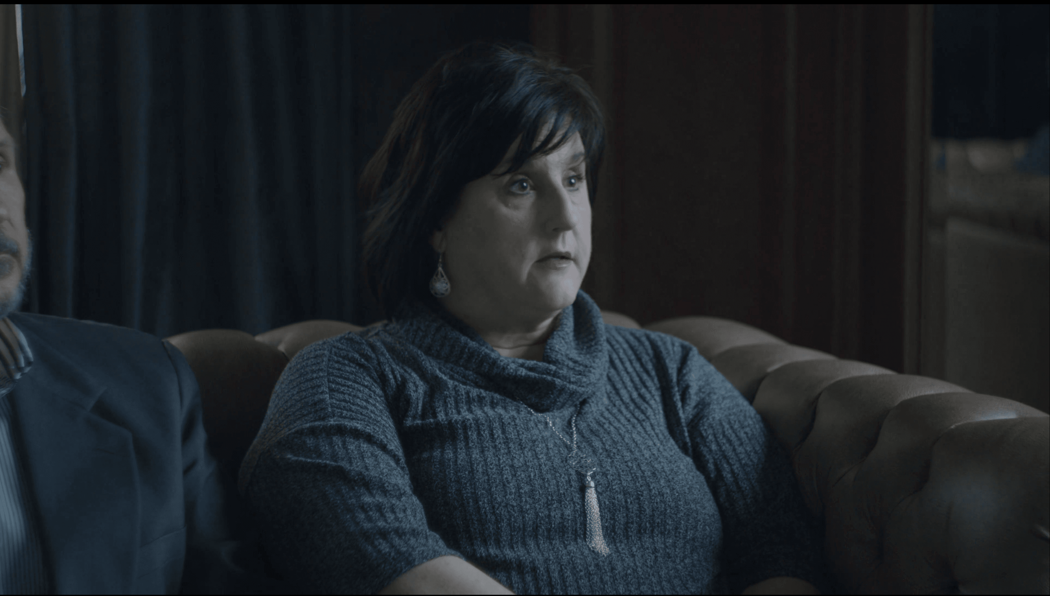 Woman sharing her experience during a testimonial interview